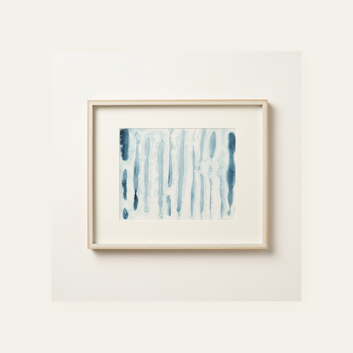 Framed abstract indigo watercolor of soft vertical brushstroke lines