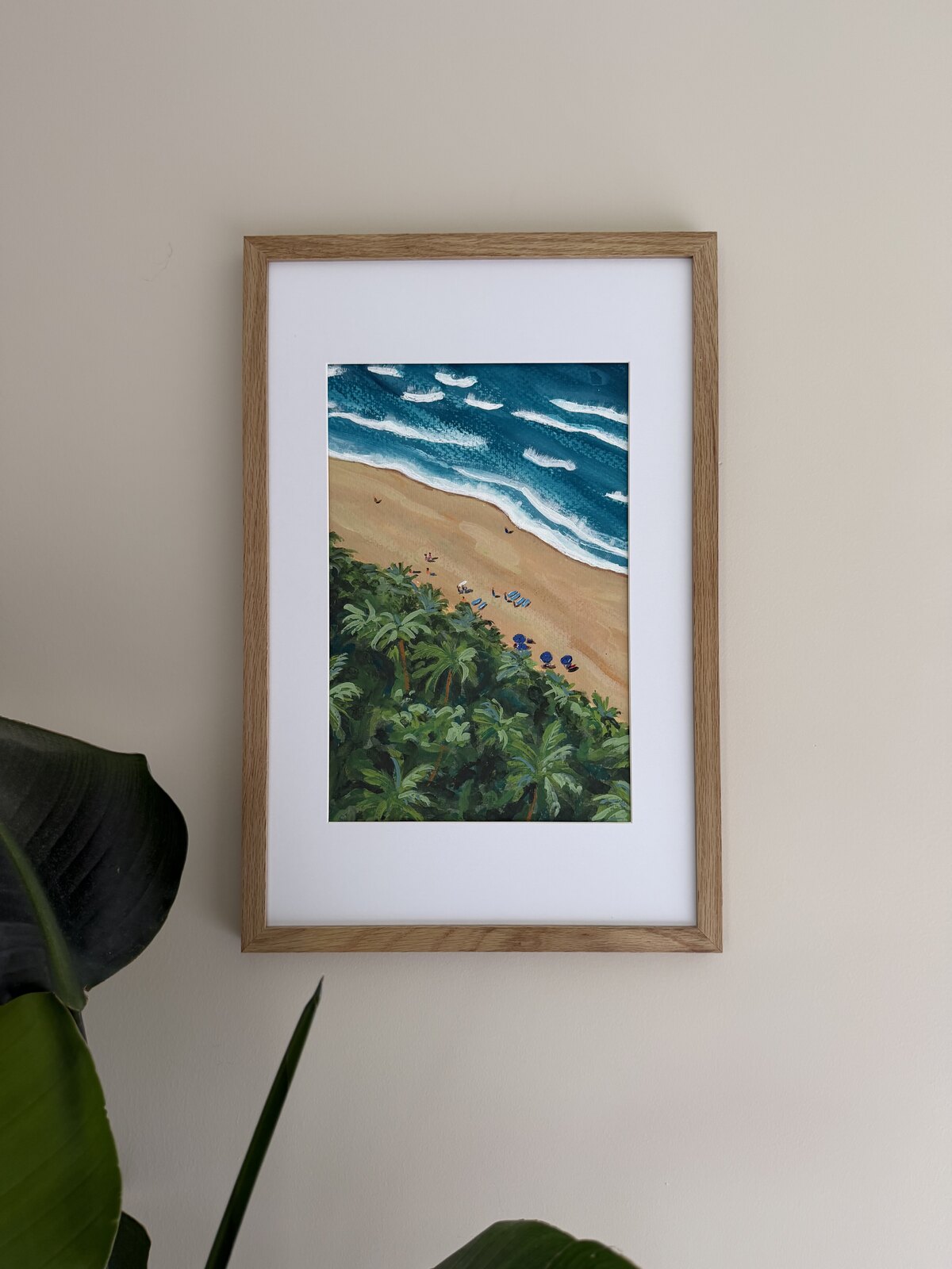 Aerial coastal painting of a beach and palm trees