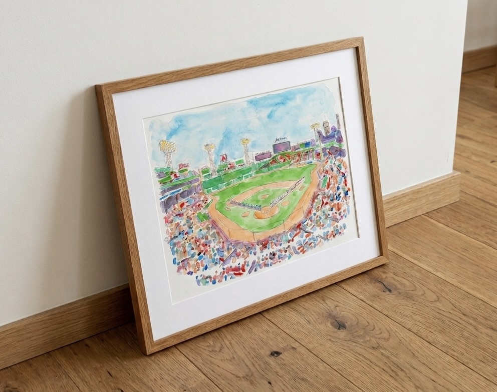 Framed watercolor of a lively baseball stadium filled with fans