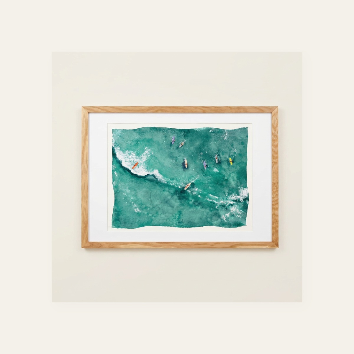 Framed wide aerial watercolor of surfers scattered across emerald green water