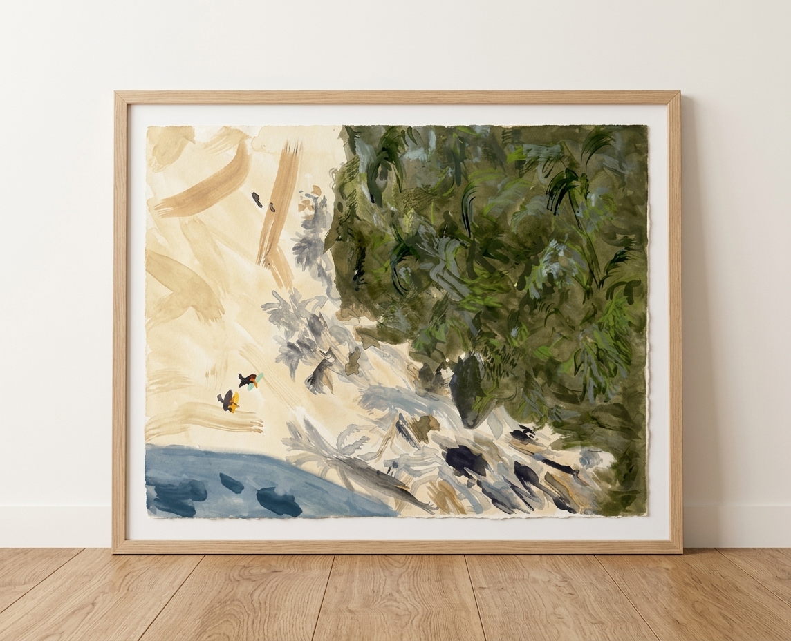 Framed horizontal watercolor of a sandy cove bordered by dense coastal greenery