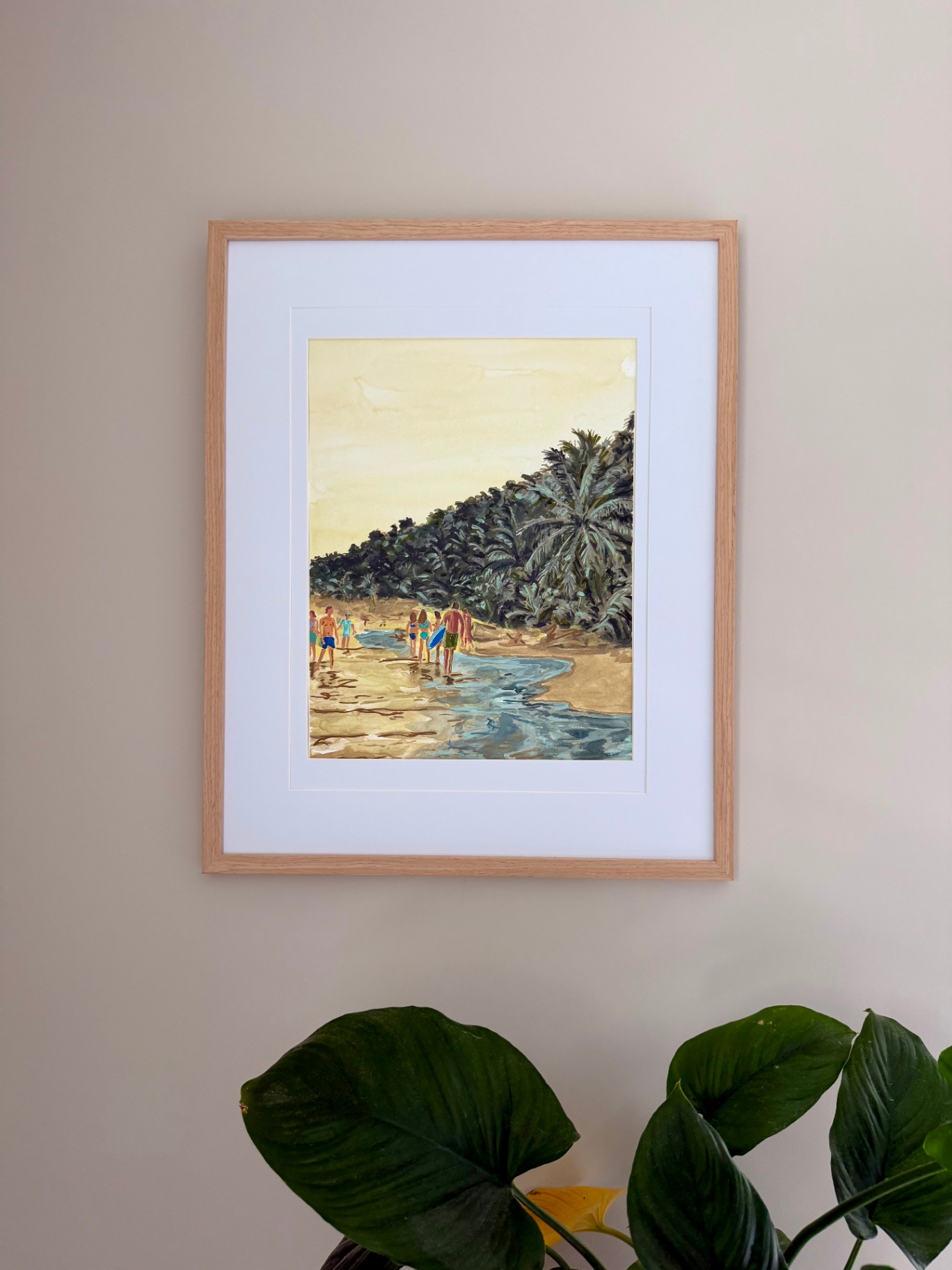 Framed watercolor of people walking along a tropical beach at dusk beneath palm trees