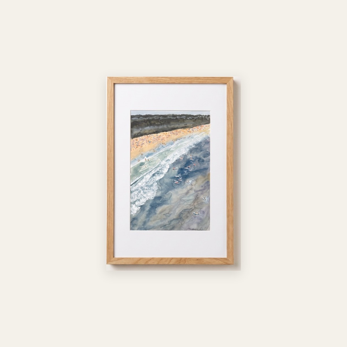 Framed aerial watercolor of Narragansett Beach with surfers beyond the breaking waves