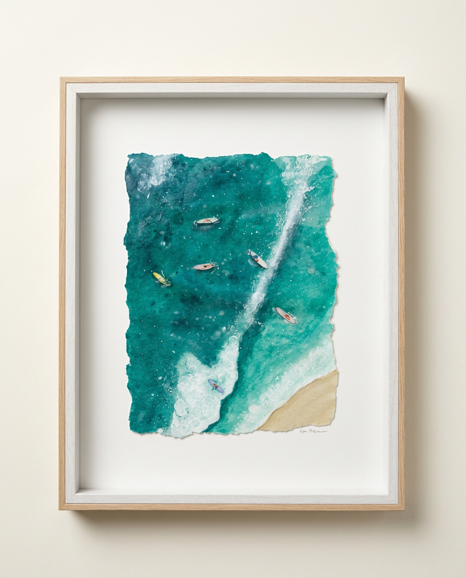 Framed aerial watercolor of surfers paddling through white water toward a sandy shore