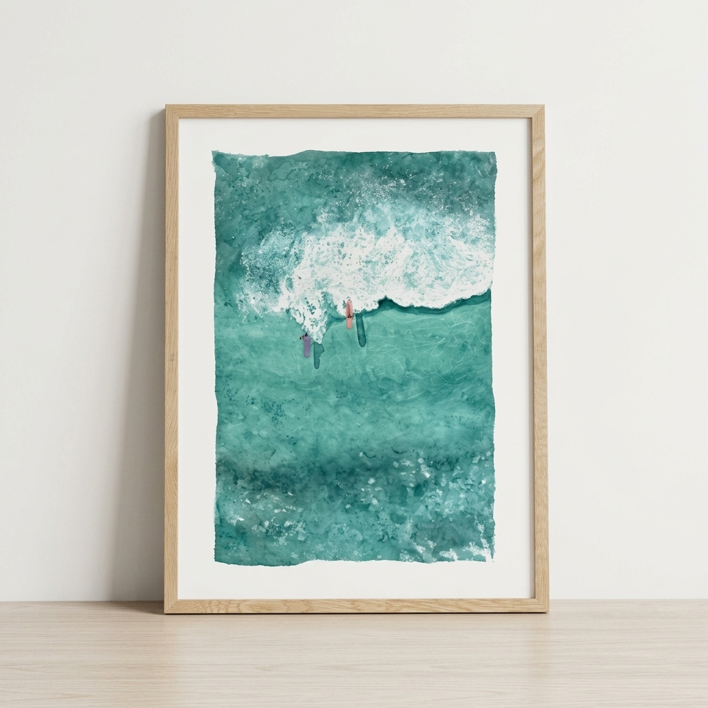 Framed aerial watercolor of two surfers beside a breaking wave in emerald water